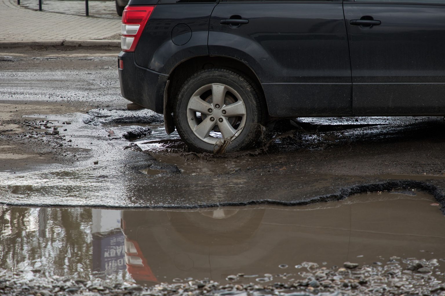 Can Hitting a Pothole Damage Your BMW or Mercedes?